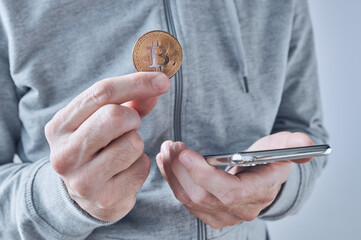 Bitcoin trading app for smartphones, conceptual image