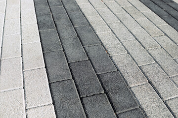 gray color paving slabs in the city, pedestrian street