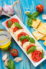Italian caprese salad with mozzarella cheese