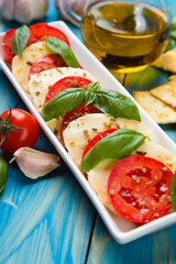 Italian caprese salad with mozzarella cheese