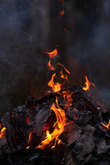 Fire flames, burning pile of cardboard and waste paper