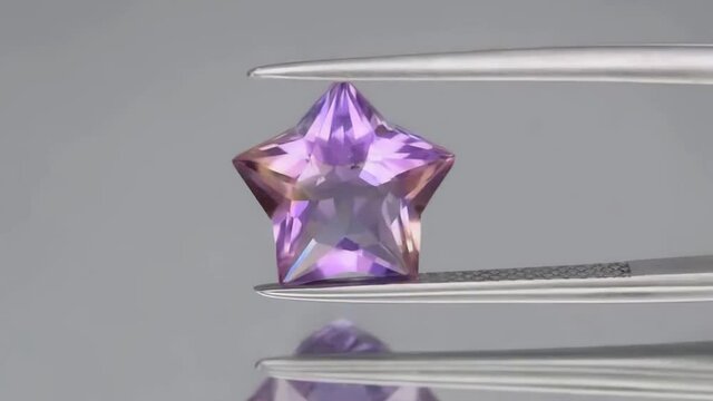 natural ametrine on the grey background