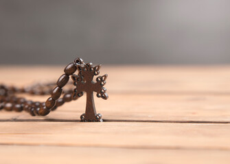 wooden cross on the table