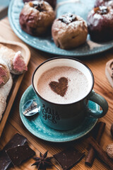 Cup of coffee on wooden table. valentine's day