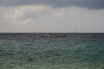 Two small boats at sea in Ivan Dolac, Croatia.