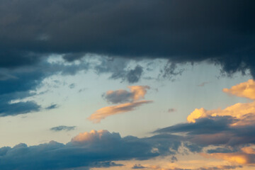 glowing clouds on evening sky. beautiful nature background