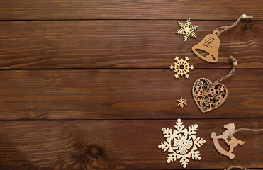 Christmas wooden toys on a wooden background top view