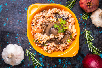 Fototapeta na wymiar Risotto with mushrooms ande vegetables