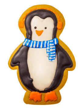 Gingerbread cookie of cute penguin on white background isolated. Traditional Christmas food. Christmas and New Year holiday concept..Hand painted. Comfort food. Christmas treat.