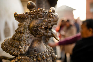 A metal lion statue at the Swayambhunath Temple in Kathmandu, Nepal..