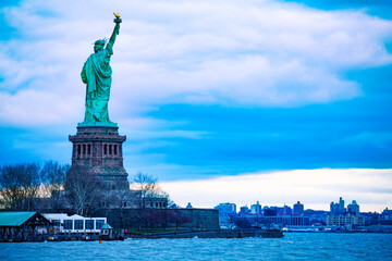 The Statue of Liberty over the New York cityscape from Black Tom Island © Sergey Novikov