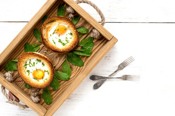 Two hot buns with an egg for a gourmet breakfast. Top view of the morning protein diet