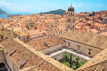 Obraz premium Summer cityscape - top view of the Franciscan Church with Monastery and the Old Town of Dubrovnik on the Adriatic Sea coast of Croatia