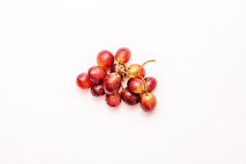 small bunch of red grapes on white background