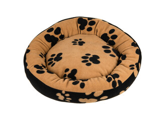 Pet's paw print on a soft and fluffy dog's bed isolated on white background