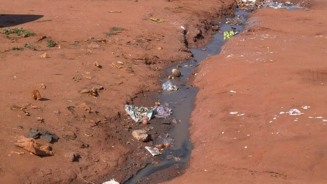 Effluent water flowing from portable toilets in a squatter camp during lockdown for Covid-19 Coronavirus pandemic