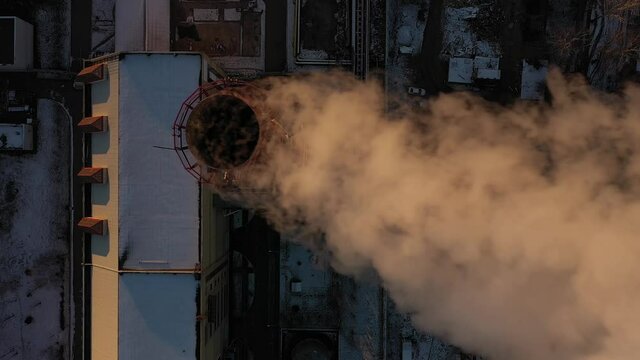 Aerial top-down view of an industrial smoke stack
