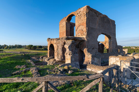 Rome, Villa dei Quintili, remains of the thermal baths, of the frigidarium on the Via Appia in Rome, on a beautiful day with blue sky an imposing, panoramic image.