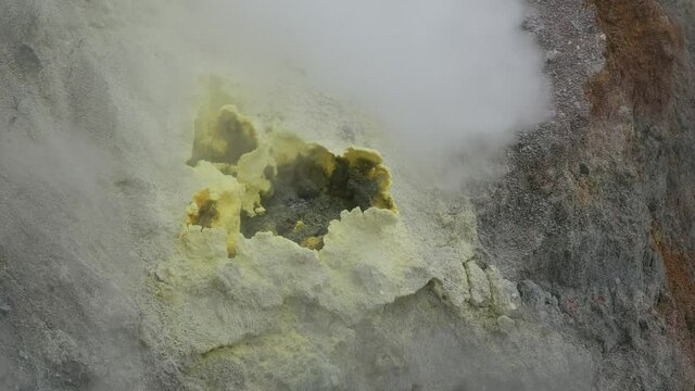 Fumaroles in crater of active Mutnovsky volcano, Kamchatka, Russia, 4k