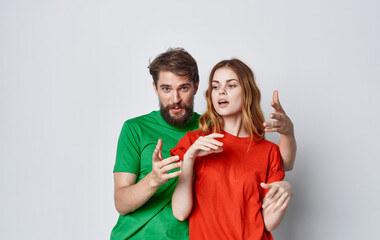 young couple multicolored t-shirts lifestyle mockup studio