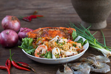 Thai spicy seafood salad with Mama noodles