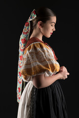 Young beautiful slovak woman in traditional dress. Slovak folklore