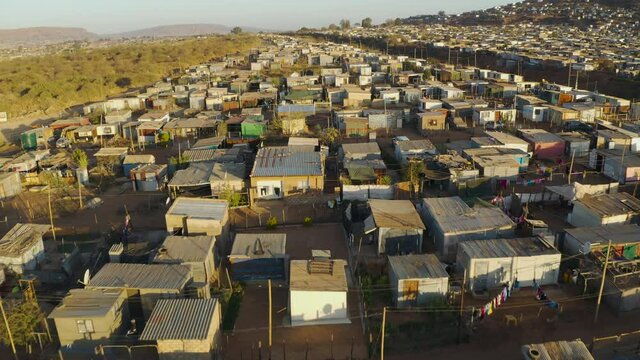Close-up aerial fly over view of the densly over crowded and populated Mamelodi African township(squatter camp), South Africa