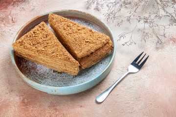 front view delicious honey cake inside tray on light background cake pie biscuit sweet