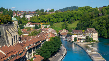 Fototapeta na wymiar Beautiful landscape in Zurich, Switzerland. Old houses, river and forest.