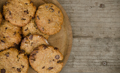 fresh baked oatmeal cookies overhead view with wood