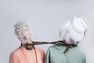 two human with rubbish on the face tightened with each other