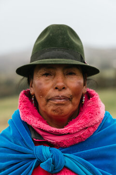 Portrait of a qechua woman wearing a traditional hat