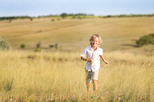 Cute little boy outdoors, space for text. Child spending time in nature