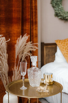 The crystal decanter on a tray in interior