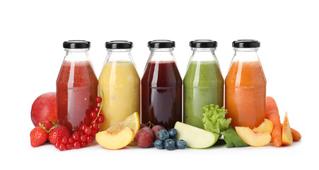 Bottles of delicious juices and fresh fruits on white background