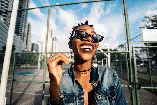 Modern afro woman laughing