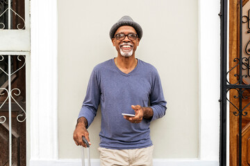 Senior black man standing.