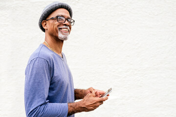 Senior black man standing.