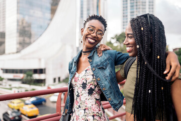 Young afro women laughing together