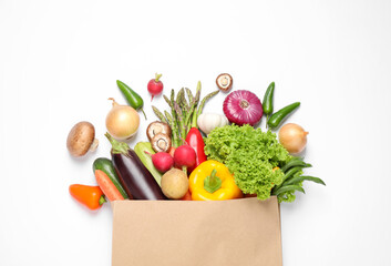 Different fresh vegetables on white background, top view