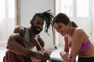 man and woman exercising together