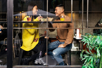 Chinese couple at a restaurant.