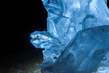 detail of transparent rock crystal illuminated from behind