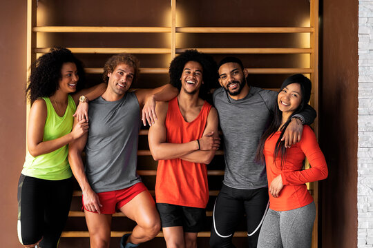 Portrait of a group of friends at gym.