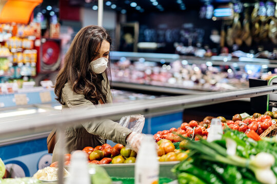 Young woman wearing a protective mask.