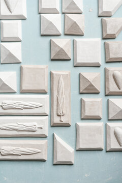 Set of various ceramic tiles on table