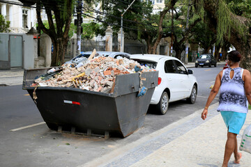salvador, bahia, brazil - december 14, 2020: bucket for transporting debris and rest of...