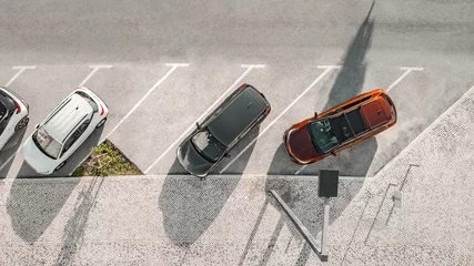 Foto auf Alu-Dibond Bad parking. Occupying two spaces. Improperly parked car. Double parking © Creative Cat Studio