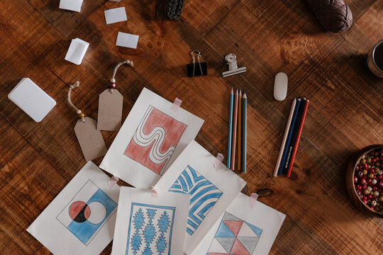 Paper patterns and stationery on brown textile