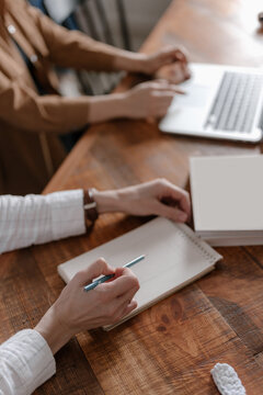 working with a colleague on sketches